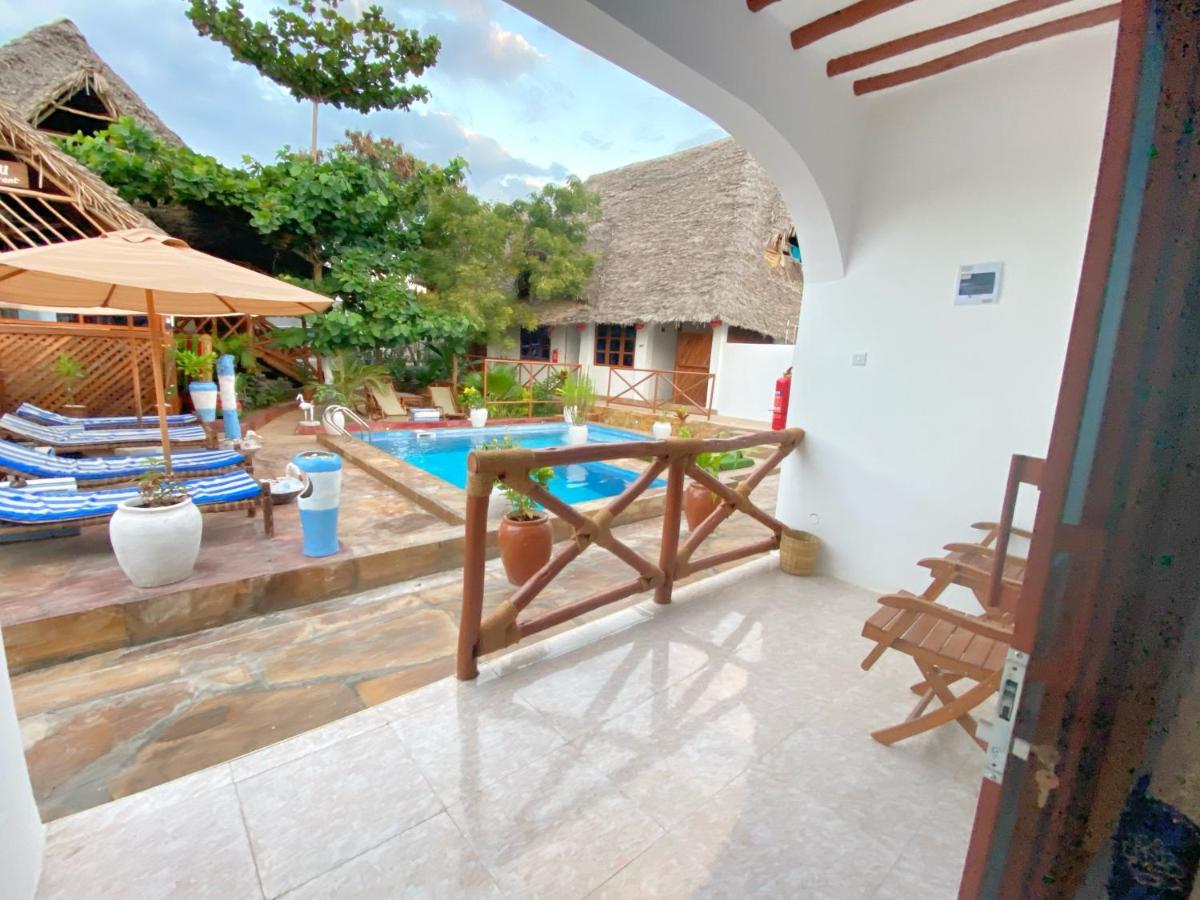 Utulivu Bungalow Nungwi Luaran gambar