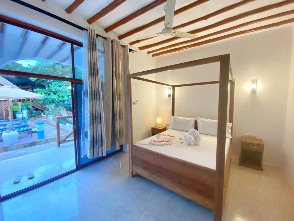 Utulivu Bungalow Nungwi Luaran gambar