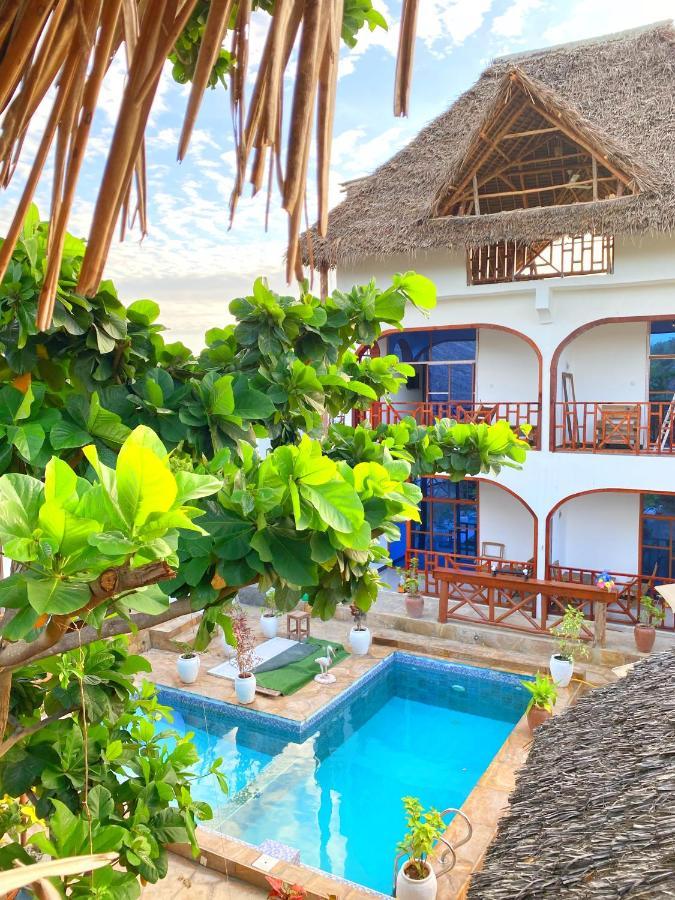 Utulivu Bungalow Nungwi Luaran gambar