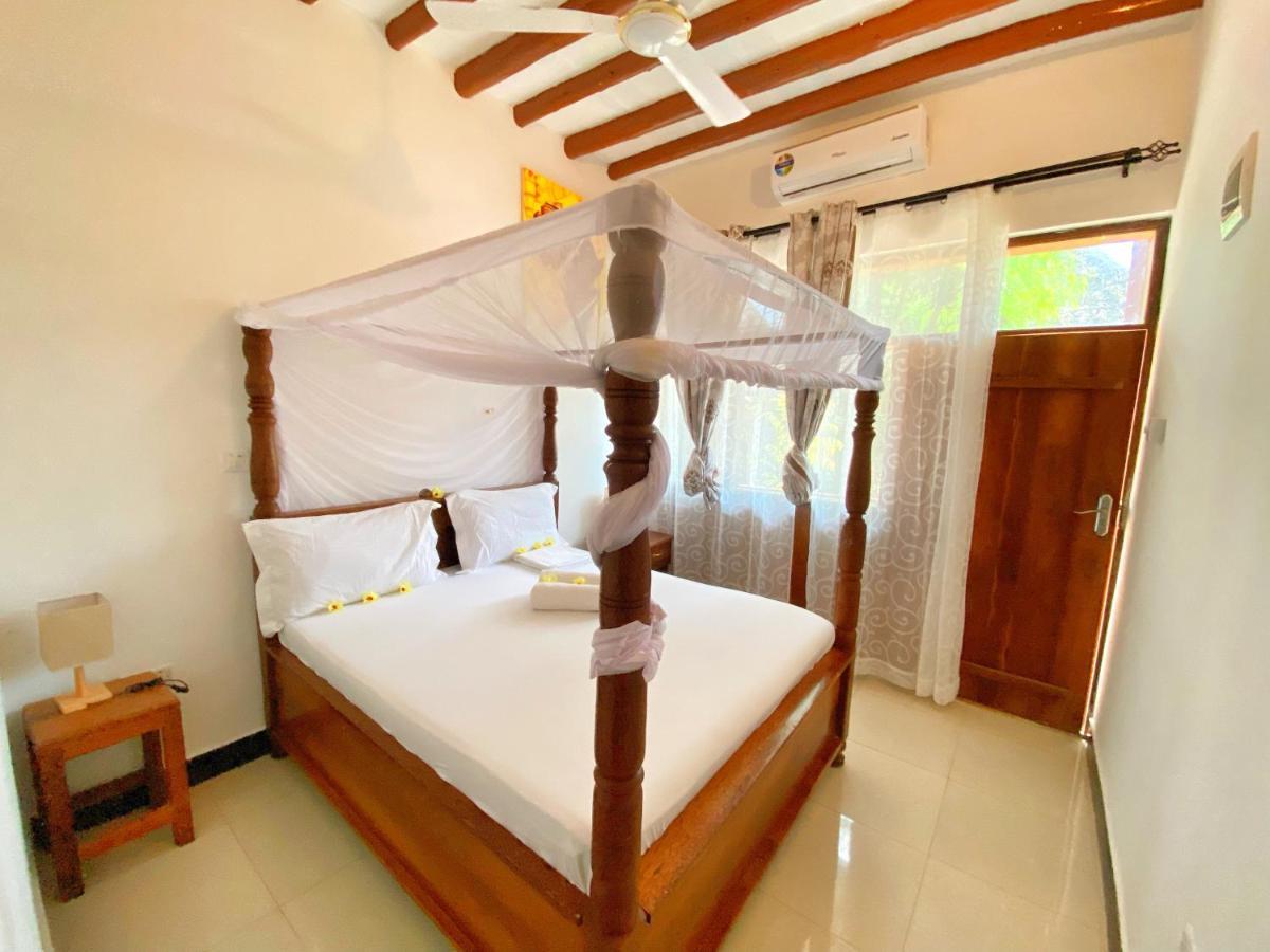 Utulivu Bungalow Nungwi Luaran gambar